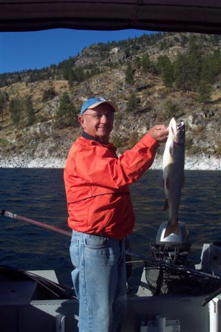 jimsutherlandfriend9lbcutthroat.jpg